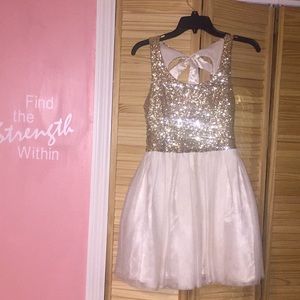 Super cute gold sequenced dress w/ bow